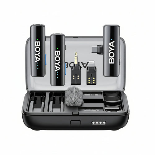 BOYALINK 2 wireless lavalier microphone set with various accessories including charging case, wind cover, and adapters displayed open on a table.