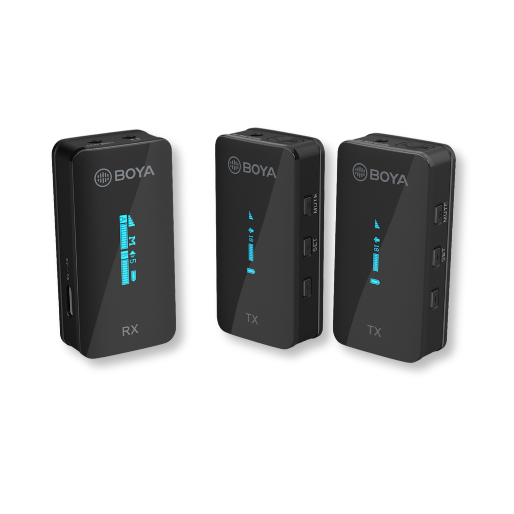 Three BOYA wireless microphone transmitters on a white background