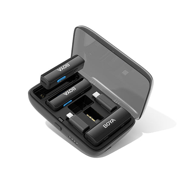BOYALINK wireless microphone charging case open with multiple microphones inside.