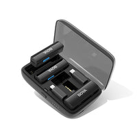 BOYALINK wireless microphone charging case open with multiple microphones inside.
